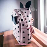 Mochila Rosada con Lunares - Encantador diseño para acompañar a las niñas en sus aventuras diarias. Perfecta para la escuela, paseos y actividades.