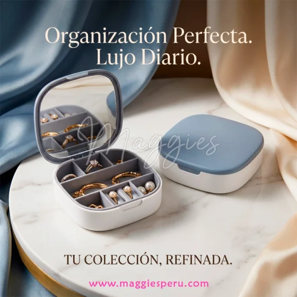 Organizador de joyas compacto con espejo y compartimentos para anillos, aretes y collares sobre mesa de mármol