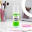 Limpiador de pinceles Cherimoya 110 ml sobre mesa de mármol, brochas de maquillaje y aro de luz al fondo