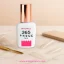Botella de Press Gel 365 de MyStyle con tapa dorada y tips de uñas sobre una mesa